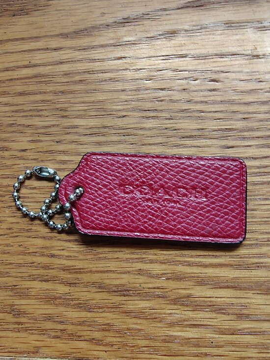 COACH Handbags - COACH TAG IN RED